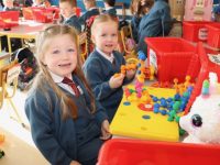 Junior infants on their first day at school at Scoil Eoin on Friday. Photo by Dermot Crean