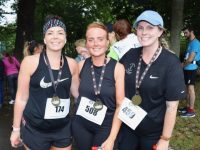 Emma Keohane, Seoirse Keniry and Megan O'Brien after taking part in the Tralee 10k on Saturday. Photo by Dermot Crean