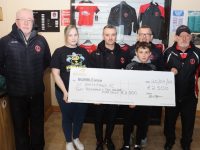 Claire Maher, on behalf of Bumbleance, accepting the cheque for €2,500 from Colm McLoughlin, Mike McCannon, Ed O'Regan, Conor McCannon and Christy Leahy of St Brendan's Park FC. Photo by Dermot Crean