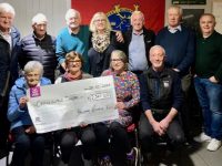 Pictured at the presentation of €2,360 to Castleisland Day Centre:Back from left: Pat O’Connor, George Glover, Pat McCarthy, Trish Horan, Tom Horan, Noel Keane & Mark Corkery.    Front from left: Helen O’Connor, Joan Glover, Martina O’Donoghue, & Paul Horan