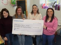 Laura Ennis (right) makes the presentation of a cheque for €2,142 to Derryquay NS. Also pictured are Lucy Dowling, Cara O'Flaherty and Principal Íde Brosnan. Photo by Dermot Crean