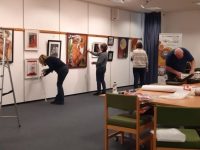 Tralee Art Group members hanging works for the upcoming 'Dreams' exhibition.