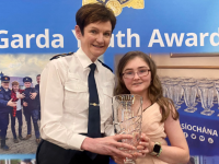 Erin O'Sullivan with her award presented by Assistant Commissioner, Anne Marie McMahon