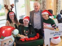 Teresa and Francie Mahon with  John Callinan of Tralee Lions Club and Corinne Evans at the Kerry Little Blue Heroes Christmas Party at Ballygarry Estate on Sunday afternoon. Photo by Dermot Crean