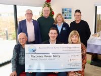 Tom O'Sullivan (seated centre) from the Kerry Association New York presents a cheque for $12,000 to Recovery Haven on Wednesday. Included are, front from left; Tim McSwiney and Gemma Fort. Back from left; Dermot Crowley, Michael Moynihan, Kathleen Collins and Marisa Reidy. Photo by Dermot Crean