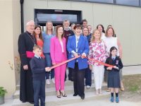 Minister for Education Norma Foley cuts the tape to officially open the new Sports Hall at Ardfert NS. Photo by Dermot Crean
