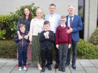 Luke Kelly with Aidan, Briana, Caroline, Padraig, Jack and Dermot Kelly at the Holy Family Primary School First Holy Communion on Saturday at Our Lady and St Brendan's Church. Photo by Dermot Crean