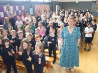 Aine Quinn with pupils and guests  at a retirement celebration held for her at St Brendan's NS Blennerville on Thursday morning. Photo by Dermot Crean