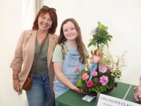 Anne Abraham with Estelle Ambrose and her 'Let's Go Party' Barbie floral creation in the Flower Tent. Photo by Dermot Crean