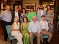 Paula Brassil (seated second from left) at her retirement  function with daughter Laura, husband Maurice and son Billy. At back is Harry McCann, Pat Costello, Mary Costello, Rachel McCann, Bryan Costello and Emma Costello at Paula's retirement function at Lotties at The Ashe Hotel on Friday evening. Photo by Dermot Crean