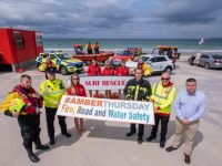 Repro Free : 30.7.2024 :: Road safety is a focus for Amber Thursday the 1st Aug . Fire, road and water safety officials gathered at Banna Strand in County Kerry this morning to launch this year’s ‘Amber Thursday’ ahead of the August bank holiday weekend which is traditionally a busy time for such services. Pictured at the launch were . Front   Yaroslav Rashyn Banna Sea Rescue , Sgt David Carney Kerry Garda  ,  Brian Crean Banna Sea Rescue , Shona Carroll Lifeguard , Brian Enright Enright Lifeguard  , Noah Edwards Lifeguard ,  Leah Long Lifeguard ,   Eoin Buckley Banna Sea Rescue , John O'Donnell Fire Officer Tralee Fire Station , TJ O'Connor RSA Road Safety Officer and Declan Keogh Road Safety Officer Kerry County Council  .
Back  : L-R :,  John Sheehan and Diyana Dimitrova Banna Sea Rescue . 

Photo By : Domnick Walsh © Eye Focus LTD .
Domnick Walsh Photographer is an Irish Aviation Authority ( IAA ) approved Quadcopter Pilot.
Tralee Co Kerry Ireland.
Mobile Phone : 00 353 87 26 72 033
Land Line        : 00 353 66 71 22 981
E/Mail :        info@dwalshphoto.ie
Web Site :    www.dwalshphoto.ie
ALL IMAGES ARE COVERED BY COPYRIGHT ©
PRESS INFORMATIO ENCLOSED :: Road safety is a focus for Amber Thursday.
Fire, road and water safety officials gathered at Banna Strand in County Kerry this morning to launch this year’s ‘Amber Thursday’ ahead of the August bank holiday weekend which is traditionally a busy time for such services. 
After another tragic weekend on the roads resulting in multiple fatalities in separate incidents, and with people taking to the water, having barbeques or campfires etc, ‘Amber Thursday’ is an inter-agency joint initiative to raise awareness of the risks and dangers on the road, in water or with fire. This year, there is a heavy focus on road safety. 
Kerry County Council’s Road Safety Officer Declan Keogh said: “Time and time again we hear of another tragic incident which has taken a life on the roads. Every person who uses the road needs to be aware of the risks all around them. While one person might be doing everything safe and correct, the actions of another road user could change all of that in an instant. We are appealing to motorists in particular, to always drive safe and sober, drive within the speed limits and for everyone traveling in a vehicle to wear a seatbelt. Motorists also need to look out for vulnerable road users and take breaks on long journeys to avoid driver fatigue.”
Garda Inspector Gary Carroll, Roads Policing Unit at Castleisland, Co. Kerry said: “The August bank holiday weekend historically is one of the busiest weekends of the year. All members of An Garda Siochana attached to the Kerry Division are committed to working with our sister organisations to ensure the safety of the public we serve”
Water rescuers are also expected to have a busy weekend as people take to water activities. Last year, the Irish Coast Guard coordinated responses to 2,788 incidents, which was the second highest number in 5 years, and August was their busiest month with a total of 391 incidents. Lifeguards are on duty in designated areas. Swimmers are reminded to swim within their depth, not to use inflatable toys on open water and always swim at a lifeguarded beach. Swimming inland in lakes and rivers is also proven to be particularly high risk in terms of water safety. 
The bank holiday weekend can also be a busy time for firefighters who are called to various incidents including barbeque or domestic fires and road traffic collisions. To avoid injuries, or damage to property, never BBQ on a balcony and ensure the barbecue is on a flat site, well away from the house/apartment, trees or shrubs. Never leave the barbecue unattended and keep a bucket of water or sand nearby for emergencies. 
People are being particularly reminded to not light fires in or near forests, recreational areas or other amenities and motorists are asked to park responsibly and not to block emergency access routes. 
ENDS
Note to editors.
‘Amber Thursday’ is an inter-agency joint initiative to promote Fire, Road and Water Safety on the Thursday preceding the August Bank Holiday weekend, which is always high on the agenda for fire safety, water safety and road safety promotion officers.
The colour amber signifies a hazard or warning. 
Fire Service personnel, Road Safety Officers, Water Safety Development Officers, Lifeguards and Gardaí collaborate in promoting fire safety, road safety and water safety in their localities on or ahead of the Thursday before the August Bank holiday weekend.