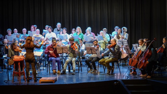 Members of Cór Seoda with Music Generation musicians in rehearsals.